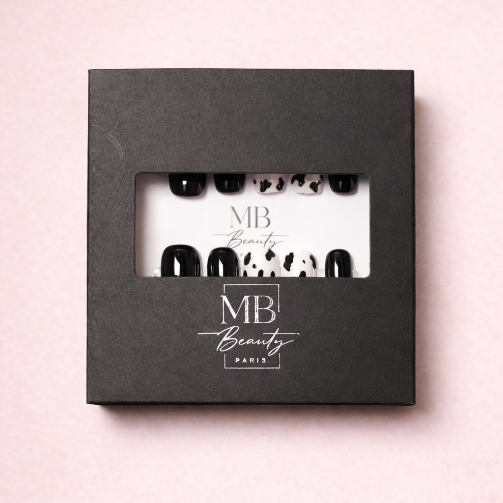 Boîte MB Beauty avec ongles press-on Moo Chic au design cow print tendance